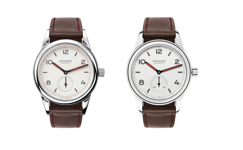 two white face brown strap watches
