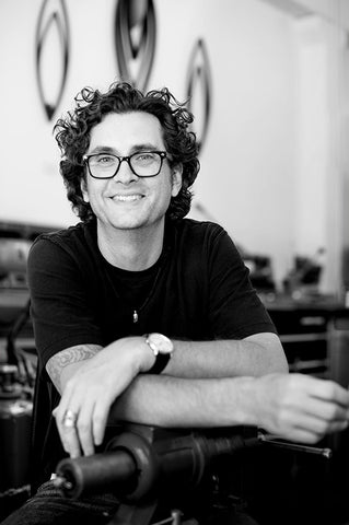 Black and White photo of Todd Reed in his shop