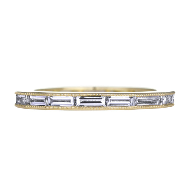 18K yellow gold channel set baguette diamond eternity band