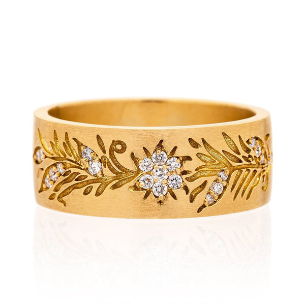 18K yellow gold wide band with etched vines and a diamond flower